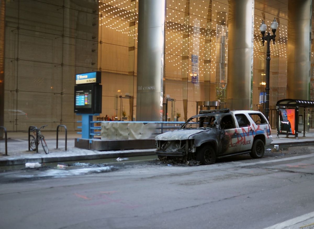 Man admits setting police SUV on fire in riot