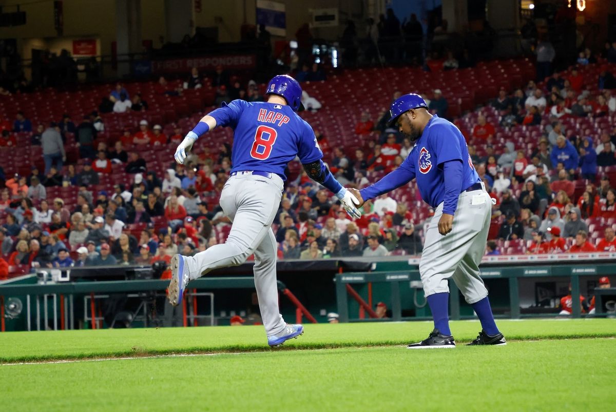 Happ, Wisdom hit 3-run HRs, Cubs top Aquino, Reds 7-4