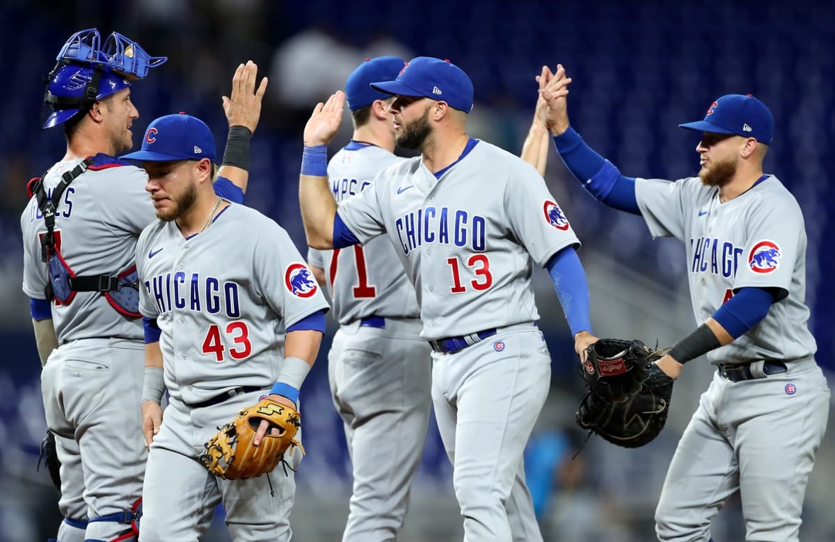 Happ's sacrifice fly caps 3-run rally, Cubs beat Marlins 4-3