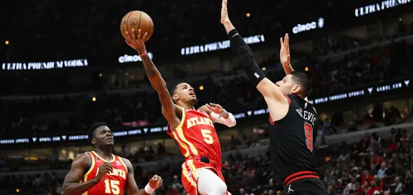 Bogdanovic's 26 lead Young-less Hawks past Bulls 123-105